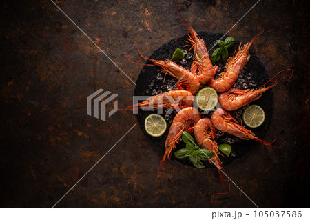 Seafood on a grungy rusty background Seafood on a grungy rusty background 105037586