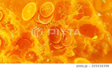 Freeze motion of mixing orange juice in twister shape. Filmed on high speed cinema camera, 1000 fps. Freeze motion of mixing orange juice in twister shape. Filmed on high speed cinema camera, 1000 fps. 105038396