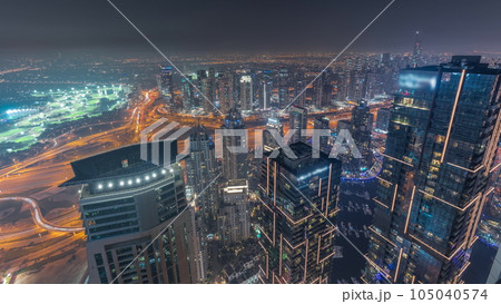 Panorama of Dubai Marina with JLT skyscrapers day to night timelapse, Dubai, United Arab Emirates. 105040574