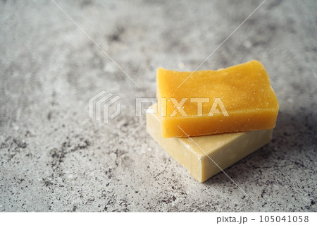 Goat Soap over gray background. Zero waste, natural organic bathroom tools. Plastic free life. Ecological skin care, body treatment concept. 105041058