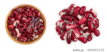 variegated kidney bean in wooden bowl isolated on white background. Top view. Flat lay variegated kidney bean in wooden bowl isolated on white background. Top view. Flat lay 105041172