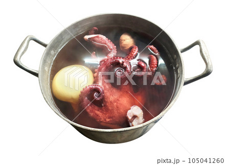 Classic cooking octopus in the village. Boiling and frying clam tentacles. Sea food. 105041260