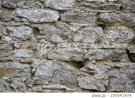 Stone wall pattern, natural stone texture, ground pavement background 105041974