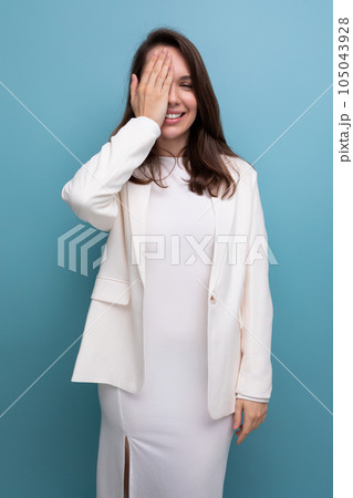 positive confident dark-haired woman in white outfit positive confident dark-haired woman in white outfit 105043928