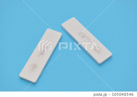 covid test kit on blue background 105048546