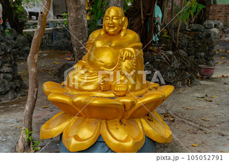 Golden Buddha on a lotus flower.  105052791