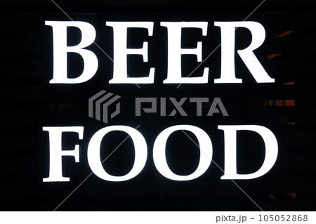 The inscription or poster food and beer at the entrance to a bar or cafe. White letters on a black background 105052868