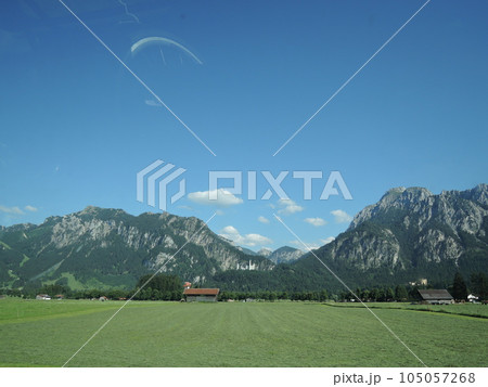 Neuschwanstein Castle is a 19th century historicist palace on a rugged hill above the village of Hohenschwangau near Fussen in southwest Bavaria, Germany. 105057268