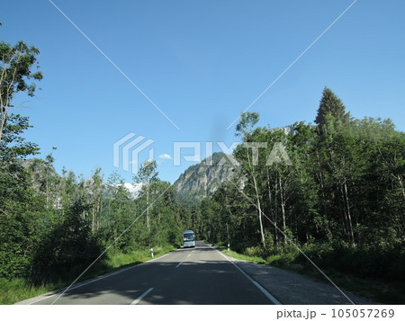 Neuschwanstein Castle is a 19th century historicist palace on a rugged hill above the village of Hohenschwangau near Fussen in southwest Bavaria, Germany. 105057269