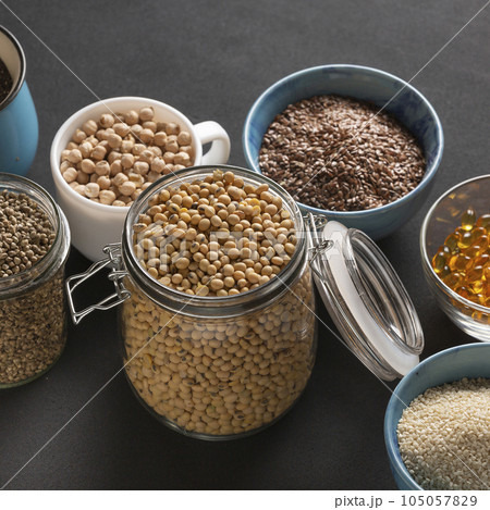 Source of vitamin E and nutrients in bowls on the table, copy space 105057829