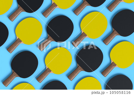 Pattern from ping pong rackets for table tennis on blue background Pattern from ping pong rackets for table tennis on blue background 105058116