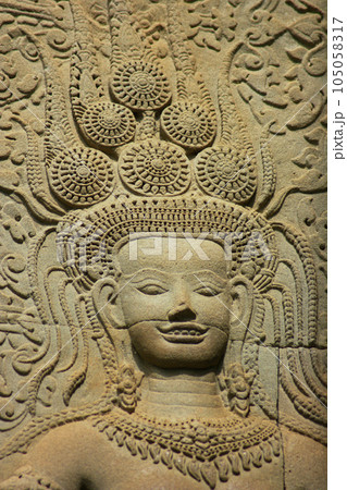 Bas relief of an Apsara dancer at Angkor Wat in Siem Reap Bas relief of an Apsara dancer at Angkor Wat in Siem Reap 105058317