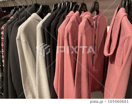 Armani Exchange sweatshirts and hoodies for sale hanging on a rack 105060681