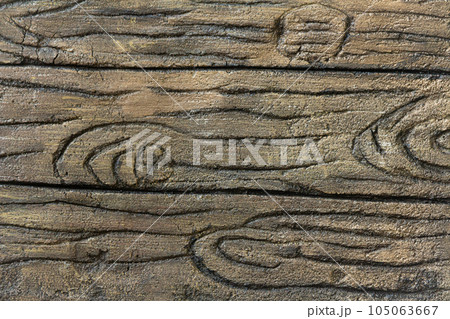 Imitation of tree bark, veneer, cement, texture, brown dark background. Copy space 105063667