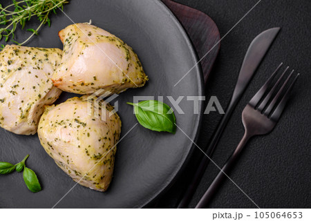 Delicious juicy grilled chicken with salt, spices and herbs with vegetables Delicious juicy grilled chicken with salt, spices and herbs with vegetables 105064653