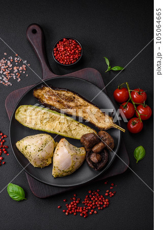 Delicious grilled vegetables zucchini, eggplant, peppers and mushrooms with salt, spices and herbs Delicious grilled vegetables zucchini, eggplant, peppers and mushrooms with salt, spices and herbs 105064665