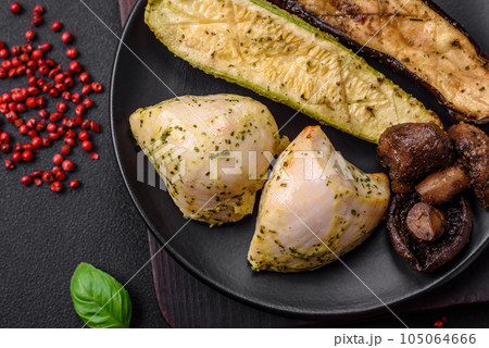 Delicious grilled vegetables zucchini, eggplant, peppers and mushrooms with salt, spices and herbs 105064666