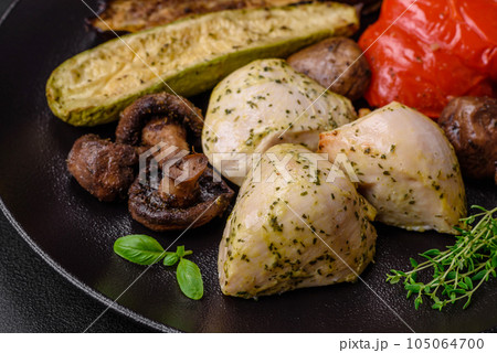Delicious juicy grilled chicken with salt, spices and herbs with vegetables Delicious juicy grilled chicken with salt, spices and herbs with vegetables 105064700