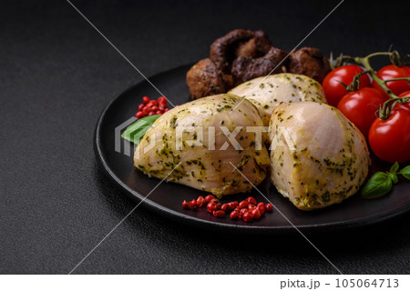 Delicious juicy grilled chicken with salt, spices and herbs with vegetables Delicious juicy grilled chicken with salt, spices and herbs with vegetables 105064713