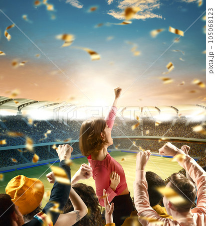 Excited woman cheers for victory of team raising one hand with confetti over evening sport arena, 3d model. Concept of sport, emotions, games, tour. Excited woman cheers for victory of team raising one hand with confetti over evening sport arena, 3d model. Concept of sport, emotions, games, tour. 105068123