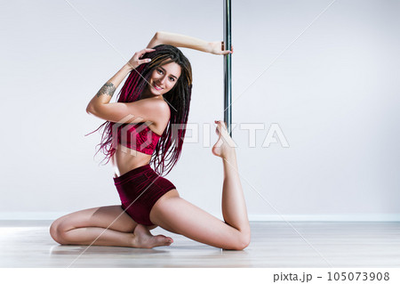 Pole dance woman 105073908