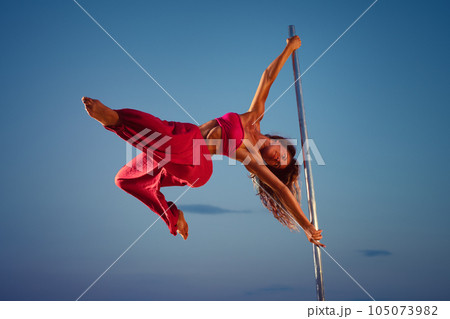 Young pole dancing woman 105073982