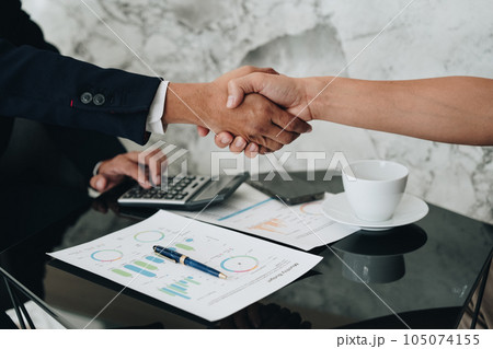 Handshake, contract deal and business partnership of meeting with shaking hands. Networking, hiring and professional negotiation of onboarding collaboration and congratulations of project. 105074155