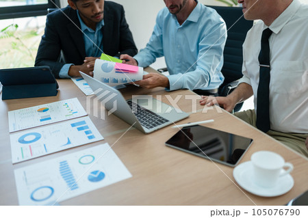 startup business, business advisor explaining strategy for planning finance investment teamwork paperwork audit and discussing marketing, profit, budget of company in meeting room startup business, business advisor explaining strategy for planning finance investment teamwork paperwork audit and discussing marketing, profit, budget of company in meeting room 105076790