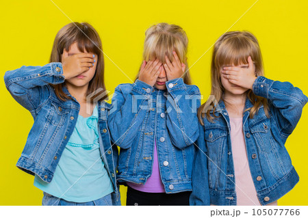 Three girls friends closing eyes with hand showing stop gesture, confused shy scared to watch Three girls friends closing eyes with hand showing stop gesture, confused shy scared to watch 105077766