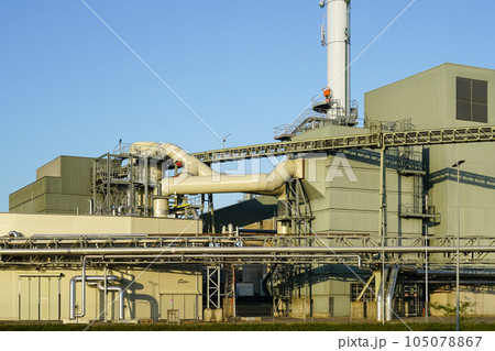 External view of equipment of large modern biomass co-generation wood chip power plant External view of equipment of large modern biomass co-generation wood chip power plant 105078867