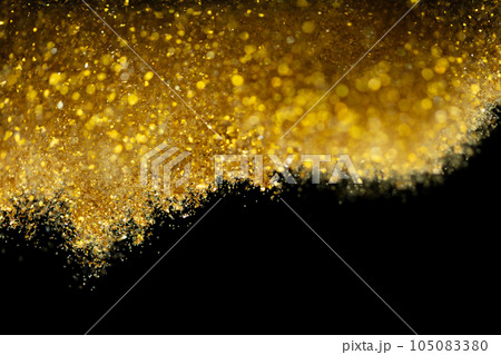 Explosion metallic gold glitter sparkle. Golden Glitter powder spark blink celebrate, blur foil explode in air, fly throw gold glitters particle. Black background isolated, selective focus Blur bokeh Explosion metallic gold glitter sparkle. Golden Glitter powder spark blink celebrate, blur foil explode in air, fly throw gold glitters particle. Black background isolated, selective focus Blur bokeh 105083380