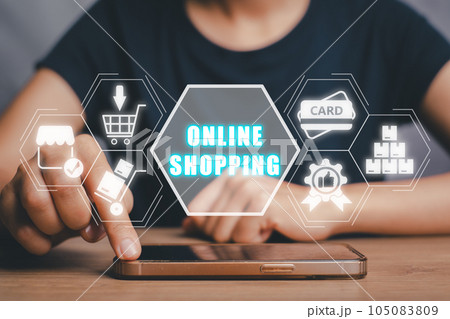 Online shopping concept, Person using smart phone on desk with online shopping icon on virtual screen. Online shopping concept, Person using smart phone on desk with online shopping icon on virtual screen. 105083809
