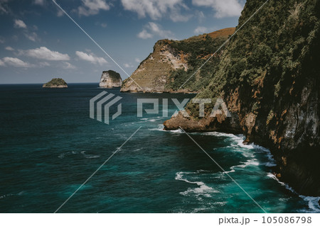 Ocean cliff shore timelapse aerial. Indonesia, Nusa Penida Island. Nobody nature scape at sea bay Ocean cliff shore timelapse aerial. Indonesia, Nusa Penida Island. Nobody nature scape at sea bay 105086798