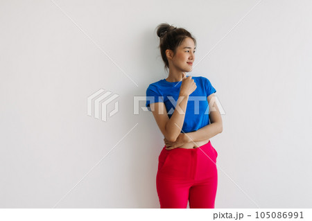 Woman in colorful clothes feeling hesitate isolated on white. 105086991