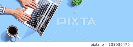 Person using a laptop computer 105089479