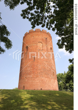 Belaya Vezha tower. From red brick. Against the background of the sky. Belaya Vezha tower. From red brick. Against the background of the sky. 105089938