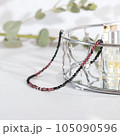 beautiful hand made seed beads necklace on a mirror tray. trendy modern chocker accessories for young women. 105090596