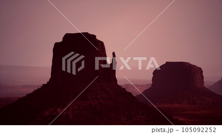 Sunset at the sisters in Monument Valley 105092252