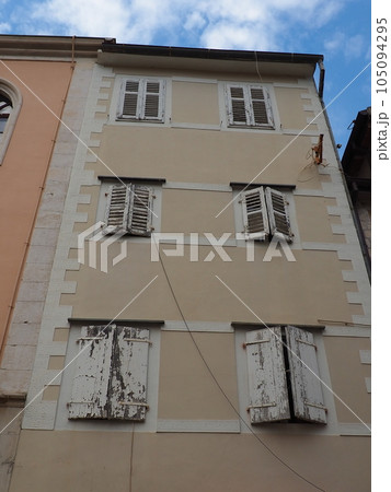 Herceg Novi, Montenegro, August 9, 2022. Architecture of the Adriatic coast of the Mediterranean. Boka-Kotor Bay. Modern and historical buildings of the old city and residential areas. Narrow streets Herceg Novi, Montenegro, August 9, 2022. Architecture of the Adriatic coast of the Mediterranean. Boka-Kotor Bay. Modern and historical buildings of the old city and residential areas. Narrow streets 105094295