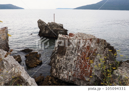Fort Mezaluna Mesaluna Citadel Citadela Montenegro, Herceg Novi. The ruins of an ancient stone fortress, destroyed in an earthquake, fell into the Adriatic Sea, the Mediterranean. Tourist attractions Fort Mezaluna Mesaluna Citadel Citadela Montenegro, Herceg Novi. The ruins of an ancient stone fortress, destroyed in an earthquake, fell into the Adriatic Sea, the Mediterranean. Tourist attractions 105094331