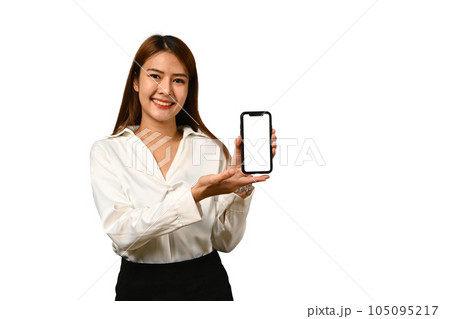 Attractive young woman showing mobile phone in hand with empty screen for your advertising text message 105095217