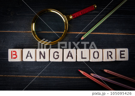 BANGALORE. City name from alphabet blocks on dark wood texture background 105095426