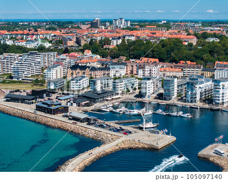 View of the Helsinborg city centre and the port of Helsingborg in Sweden. Old town by the beach and city port in Helsingborg harbour. Beautiful aerial view. 105097140