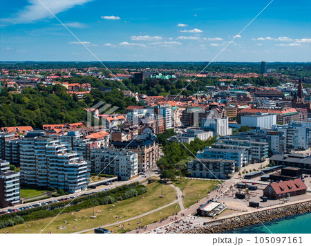 View of the Helsinborg city centre and the port of Helsingborg in Sweden. Old town by the beach and city port in Helsingborg harbour. Beautiful aerial view. View of the Helsinborg city centre and the port of Helsingborg in Sweden. Old town by the beach and city port in Helsingborg harbour. Beautiful aerial view. 105097161