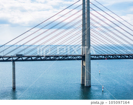 Panoramic aerial close up view of Oresund bridge over the Baltic sea between Malmo city in Sweden and Copenhagen in Denmark. 105097164