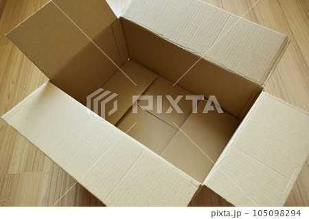 brown post box packaging put on wood floor brown post box packaging put on wood floor 105098294