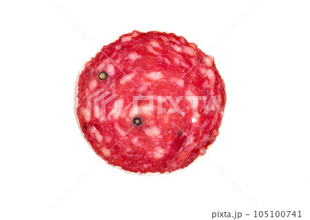 Slices of salami sausage on a white background 105100741