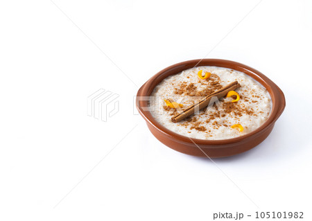 Arroz con leche. Rice pudding in white bowl isolated on white background 105101982