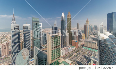 Pamorama showing skyline view of the high-rise buildings on Sheikh Zayed Road in Dubai aerial timelapse, UAE. 105102267