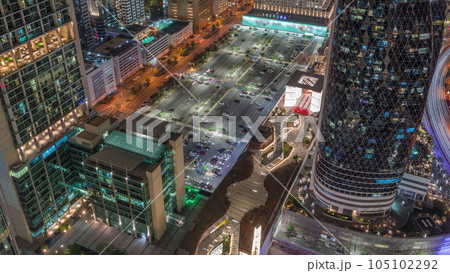 Skyline view of the high-rise buildings on Sheikh Zayed Road in Dubai aerial night timelapse, UAE. Skyline view of the high-rise buildings on Sheikh Zayed Road in Dubai aerial night timelapse, UAE. 105102292